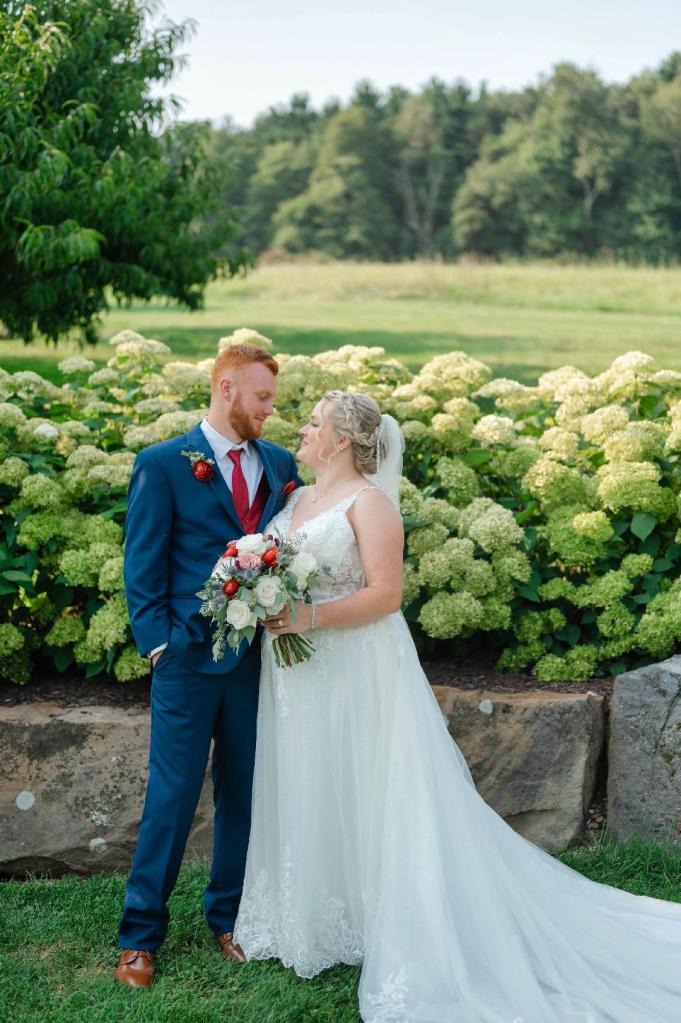 Samantha Walker Photography - Bride and Groom in front of hydrangeas in Orchard at White Pine Grove