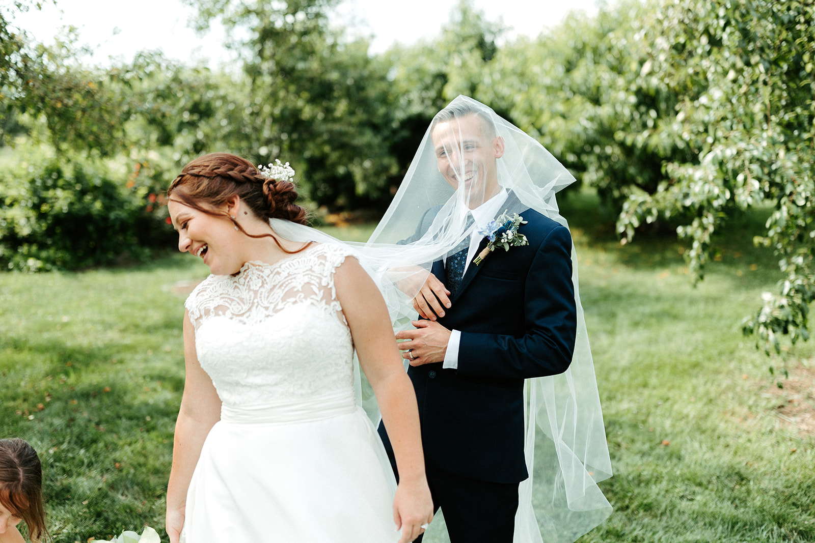 Jono Spear Photography - Bride and Groom and veil in Orchard at White Pine Grove