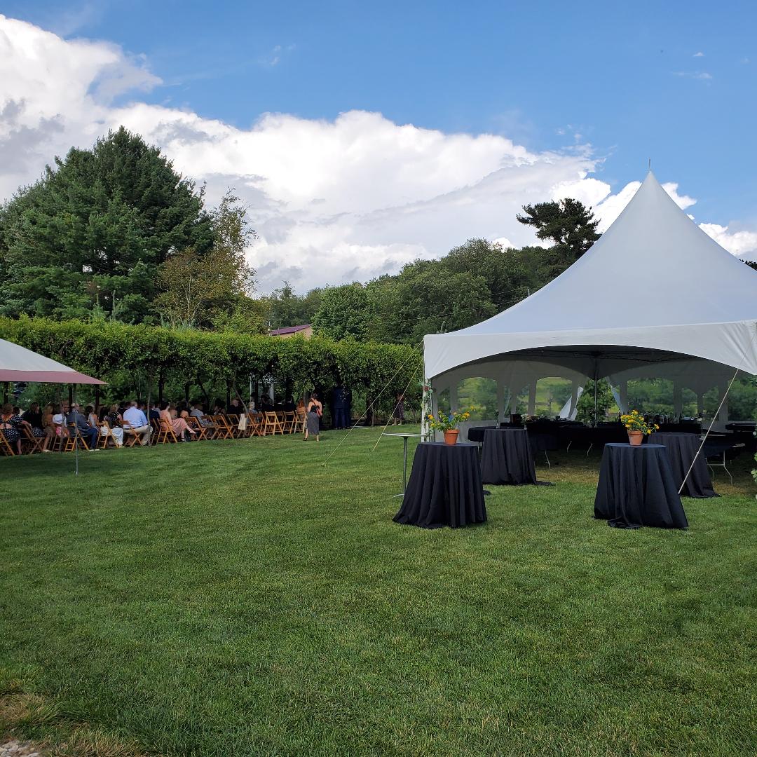 White Pine Grove view of open area with tent and cocktail tables WPG Photo
