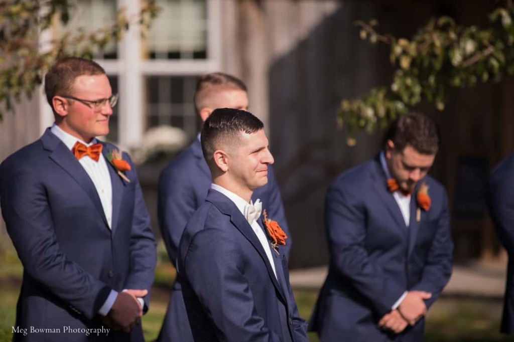 Meg Bowman Photography - Groom sees Bride walking up the aisle in the Orchard at White Pine Grove