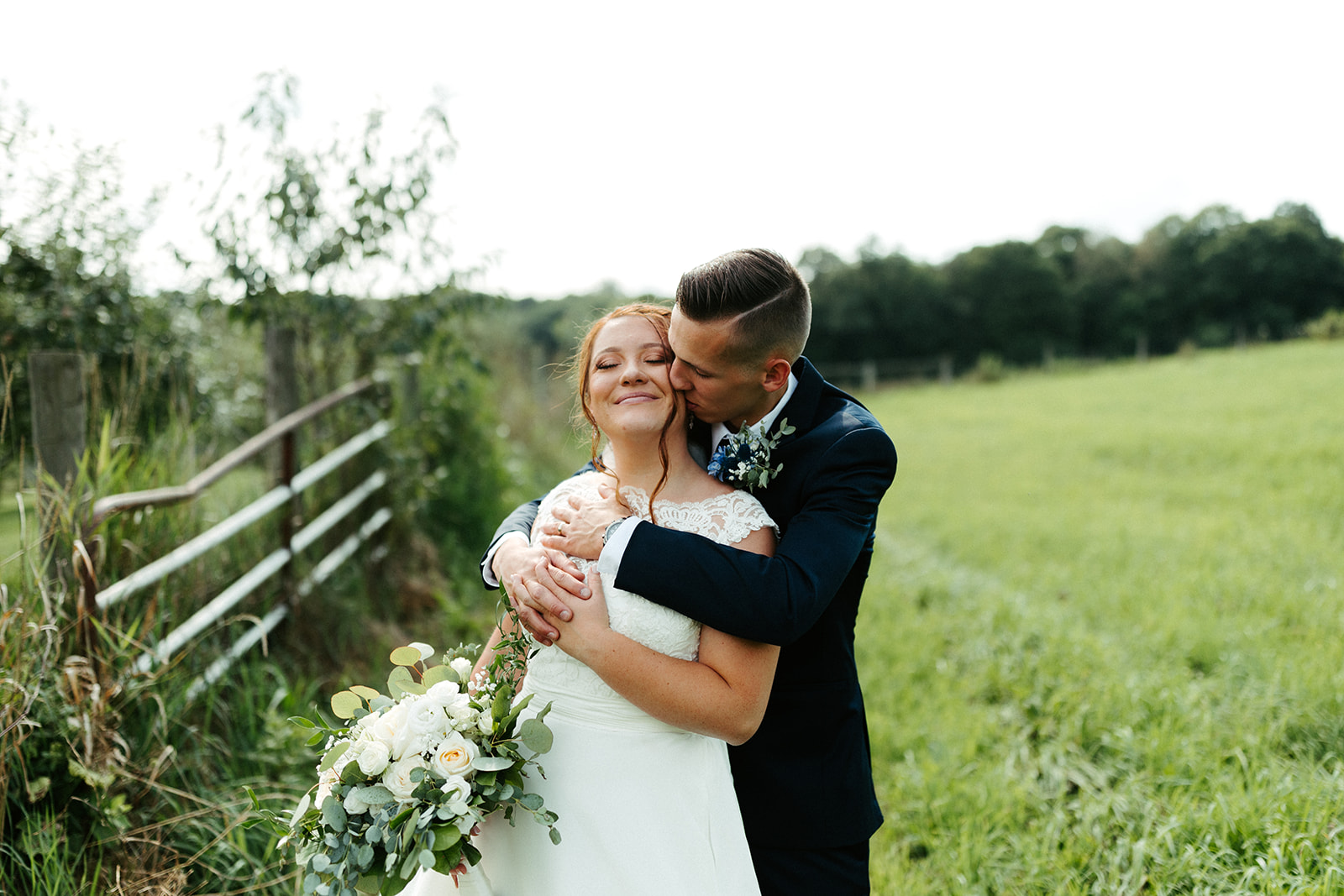 Jono Spear Photography - Bride and Groom on side of Pasture at White Pine Grove