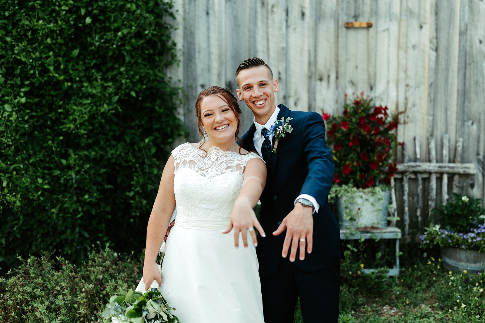 Jono Spear Photography - Bride and Groom showing off rings at White Pine Grove